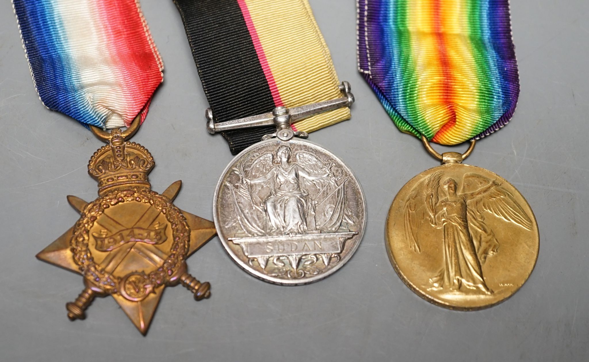 A medal trio awarded to Pte J Black, to include a Queen's Sudan, 1899